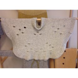 Poncho med Ostehuller