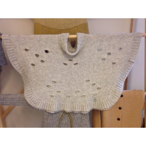 Poncho med Ostehuller